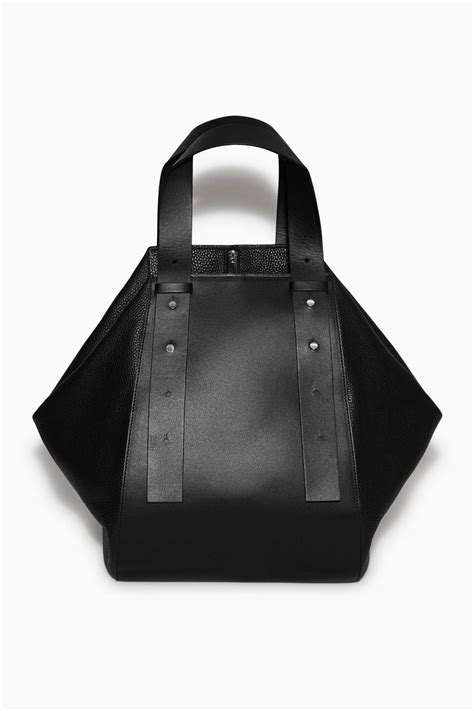 cos leather bowling bag.